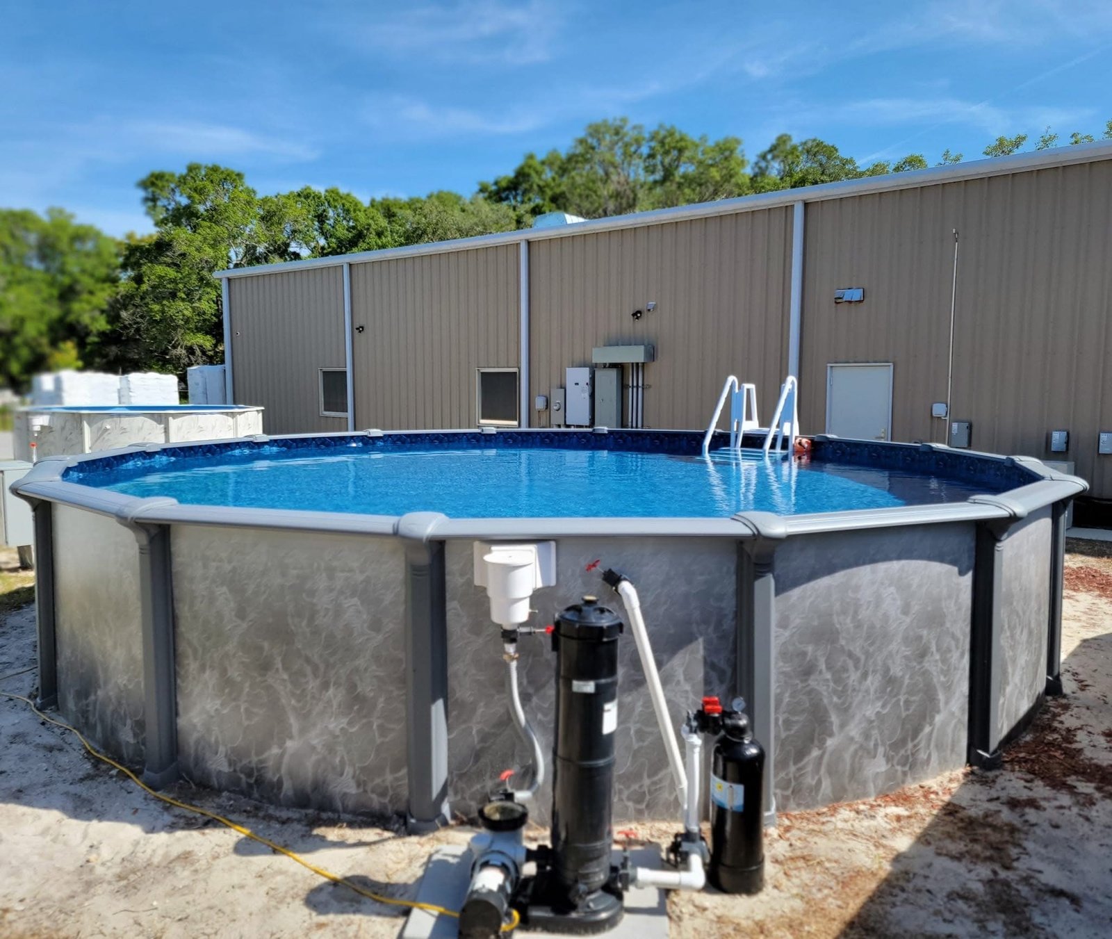 Above Ground Swimming Pools At Mr. Pool of Pasco & Crystal River 10 An Embassy above ground pool in a customer's backyard at Mr. Pool Crystal River location