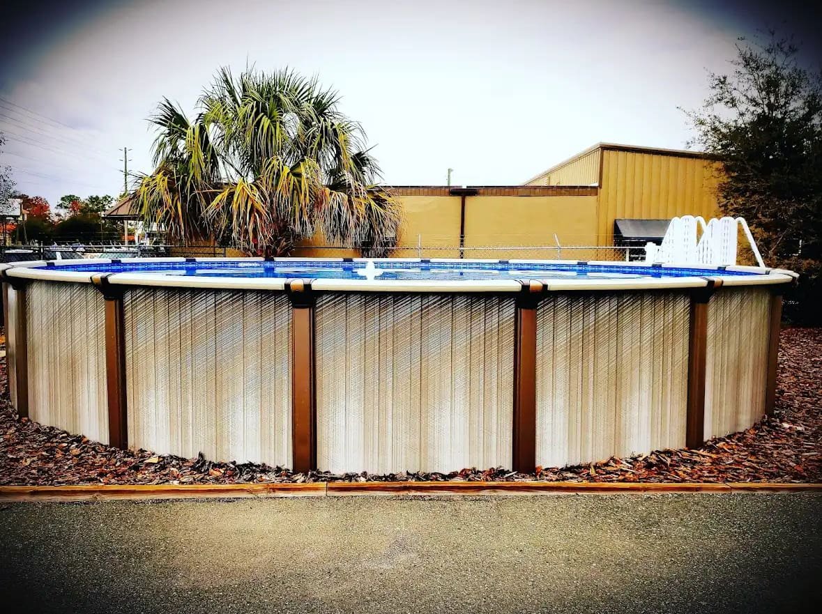 Above Ground Swimming Pools At Mr. Pool of Pasco & Crystal River 8 An above ground pool in a customer's backyard at Mr. Pool Crystal River location