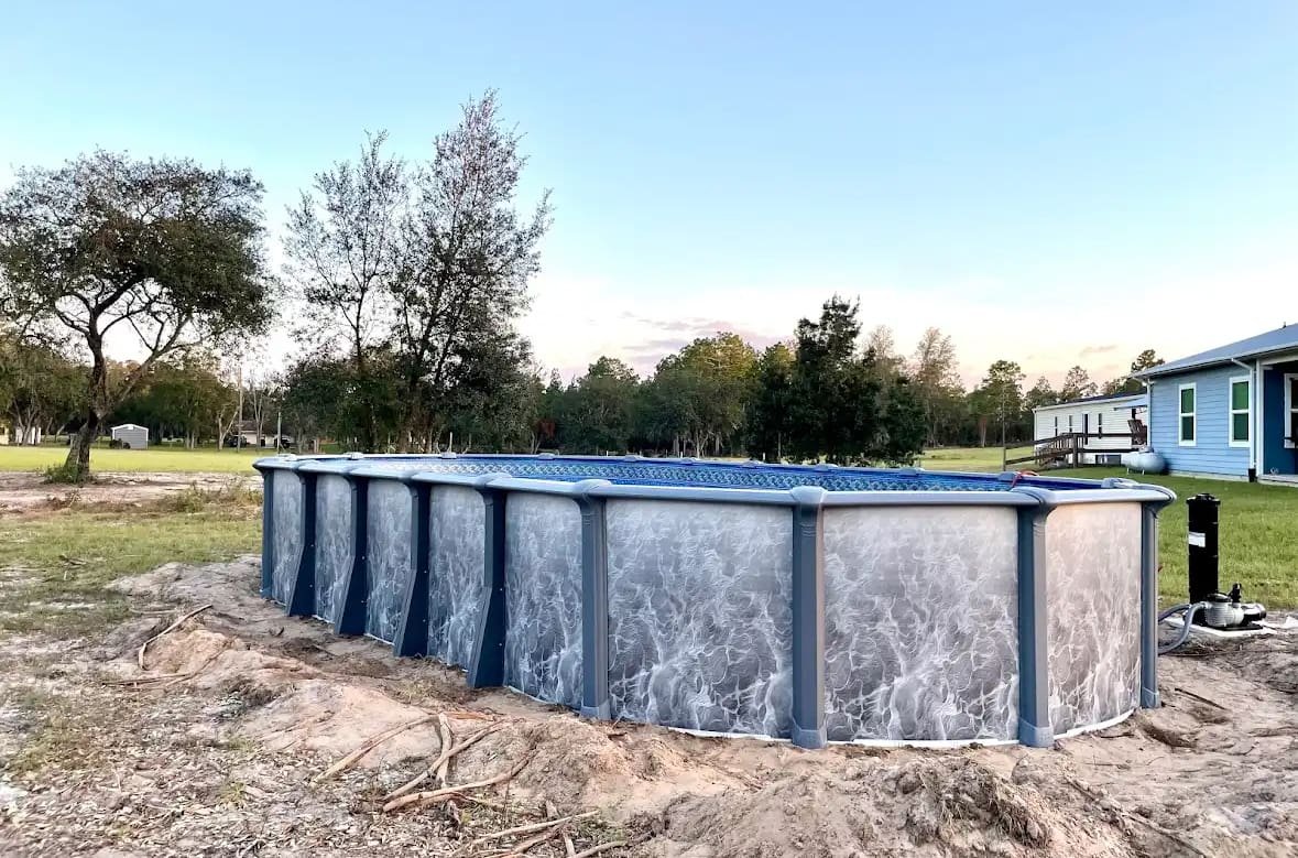Above Ground Swimming Pools At Mr. Pool of Pasco & Crystal River 7 An above ground pool in a customer's backyard
