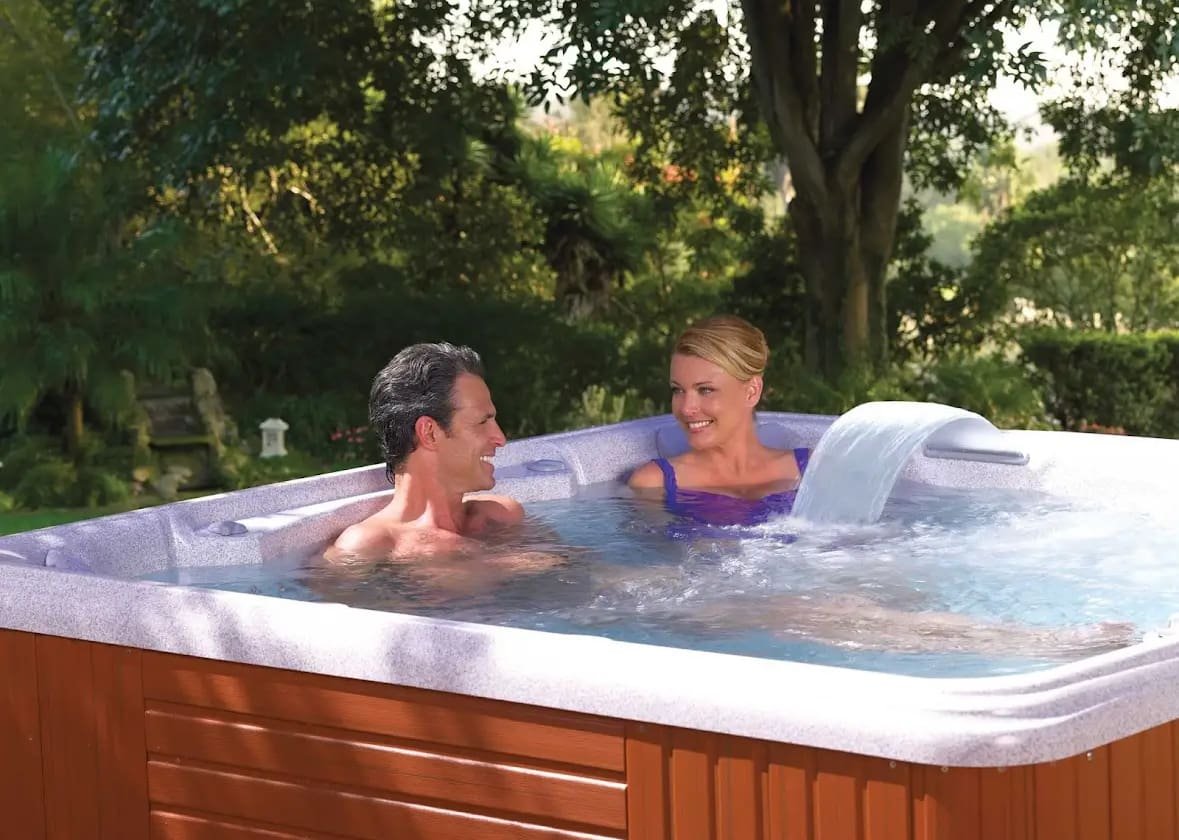 Portable Spas & Hot Tubs At Mr. Pool of Pasco & Crystal River 6 A couple sitting in a hot tub